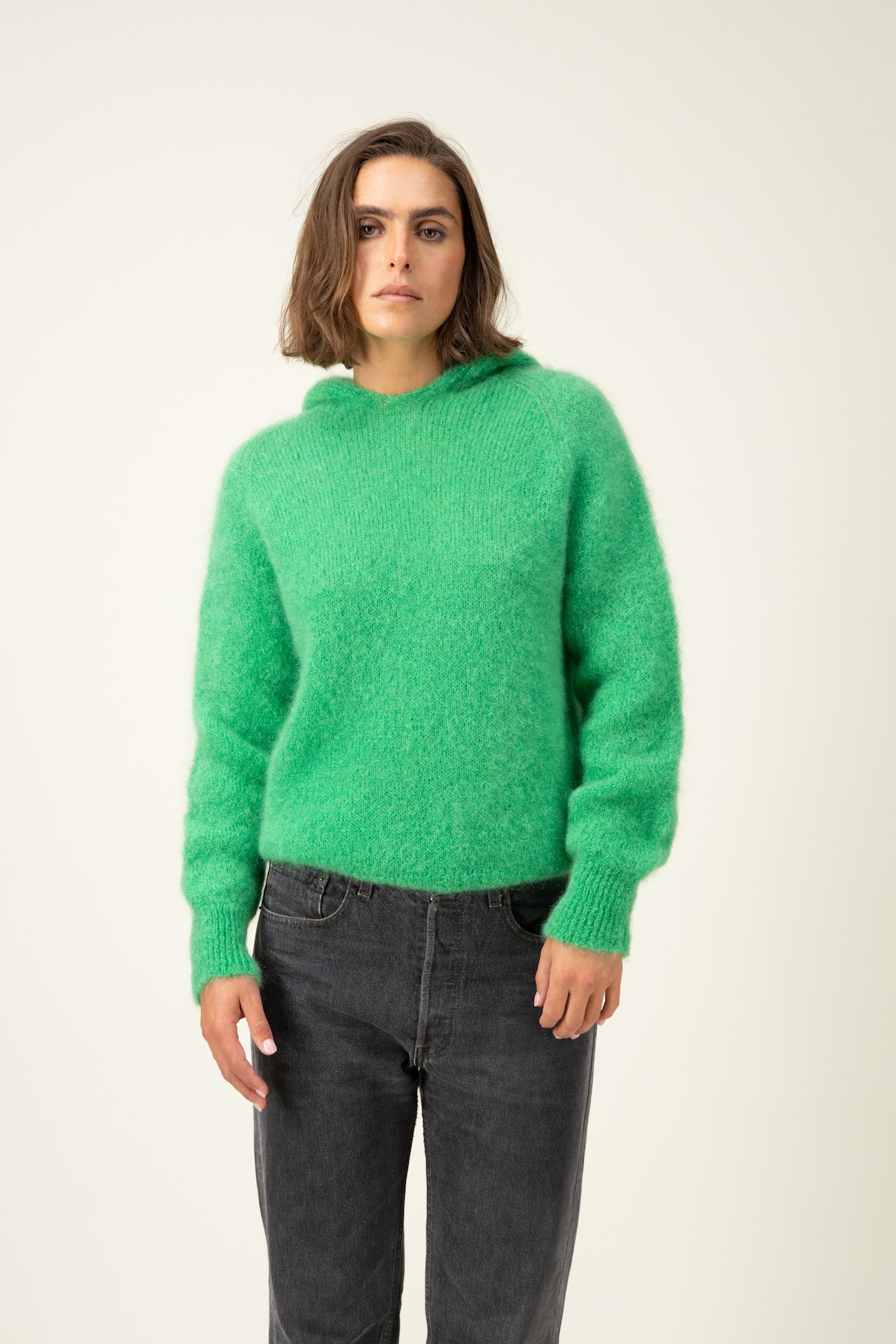 Produit Anouch capuche vert pomme confectionné par la marque Parisienne Tricots Jean Marc 1972.