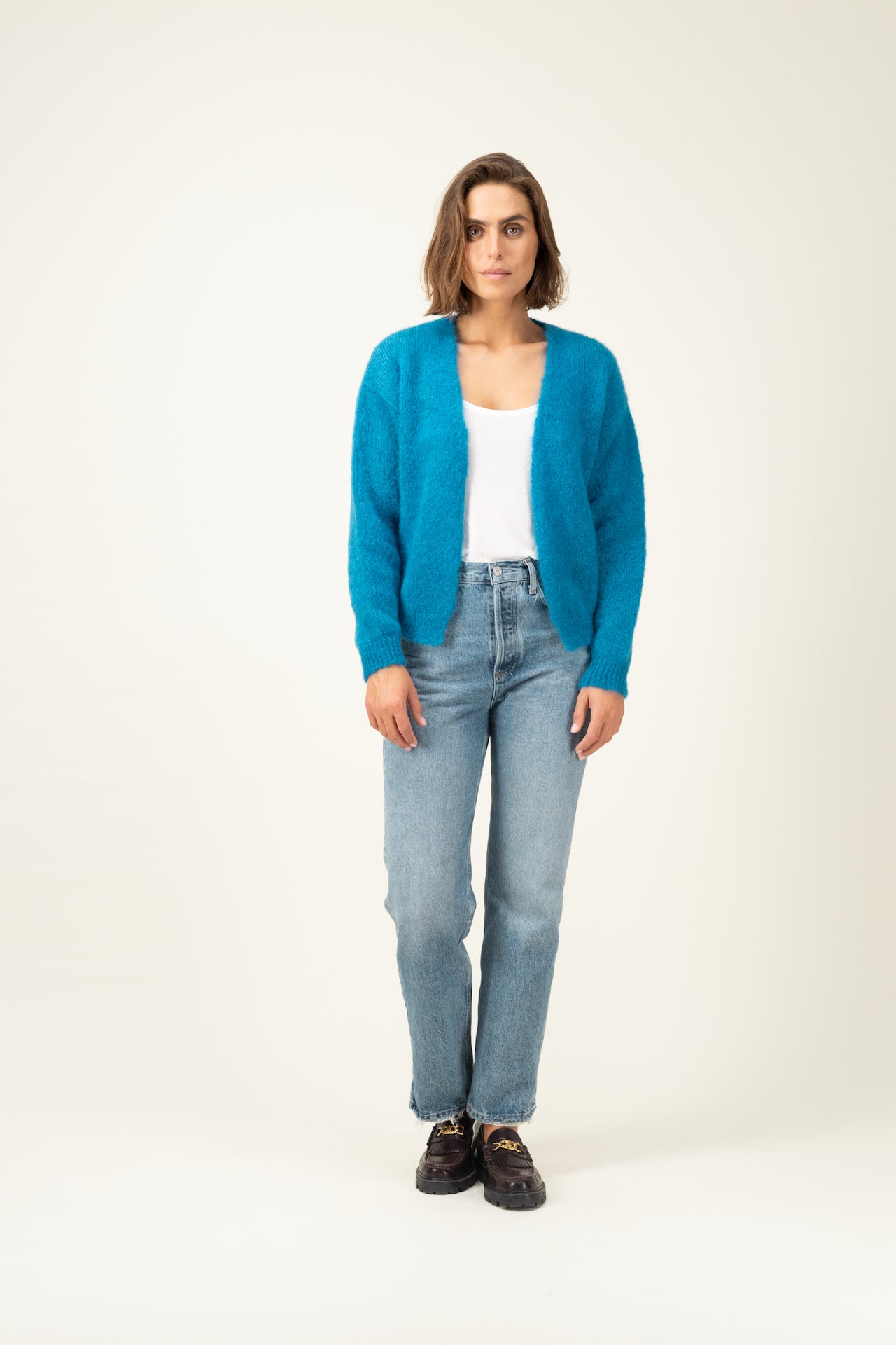 Produit Gilet Anouch bleu canard confectionné par la marque Parisienne Tricots Jean Marc 1972.