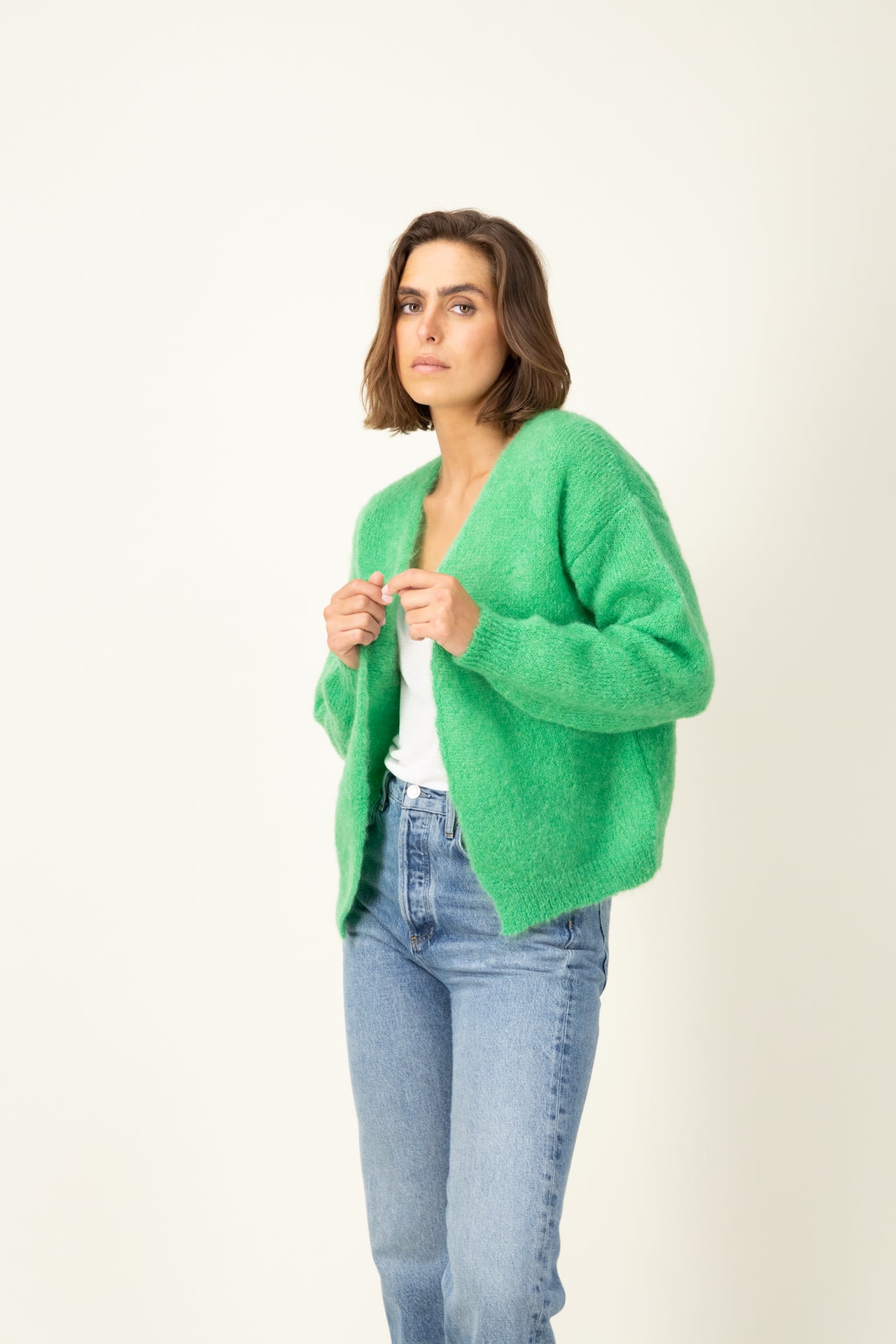 Produit Gilet Anouch vert pomme confectionné par la marque Parisienne Tricots Jean Marc 1972.