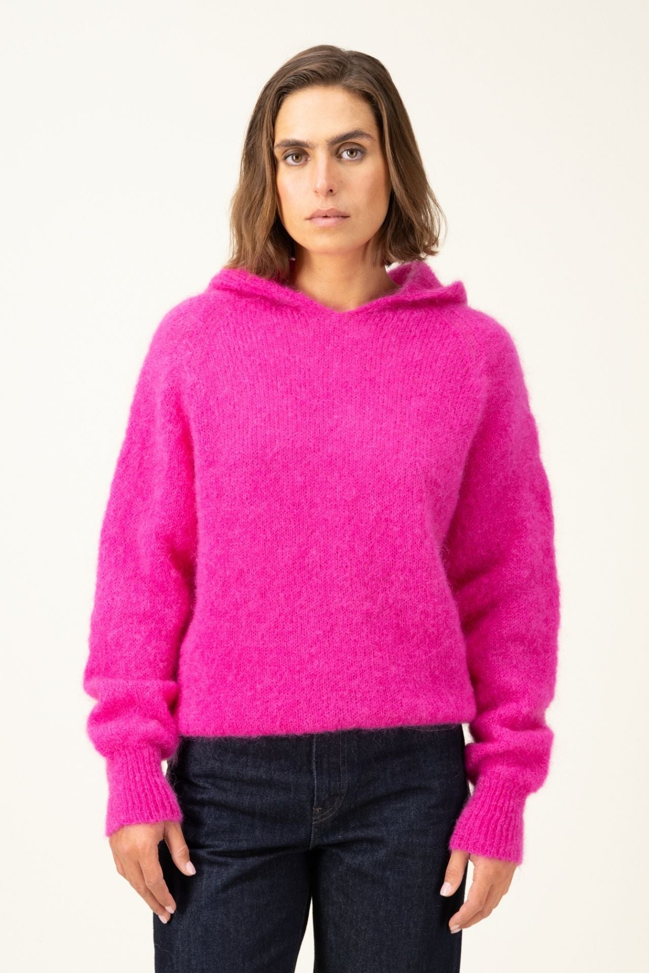 Produit Anouch capuche Fuchsia confectionné par la marque Parisienne Tricots Jean Marc 1972.