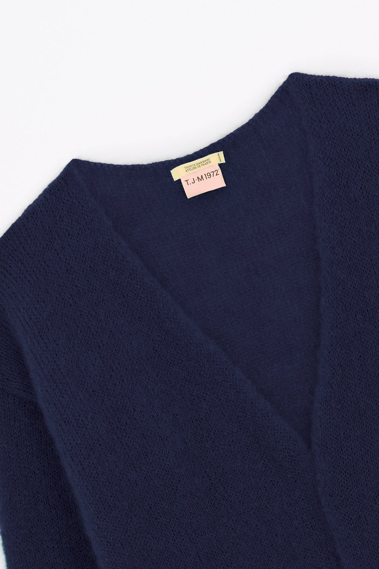 Produit Gilet Anouch marine confectionné par la marque Parisienne Tricots Jean Marc 1972.