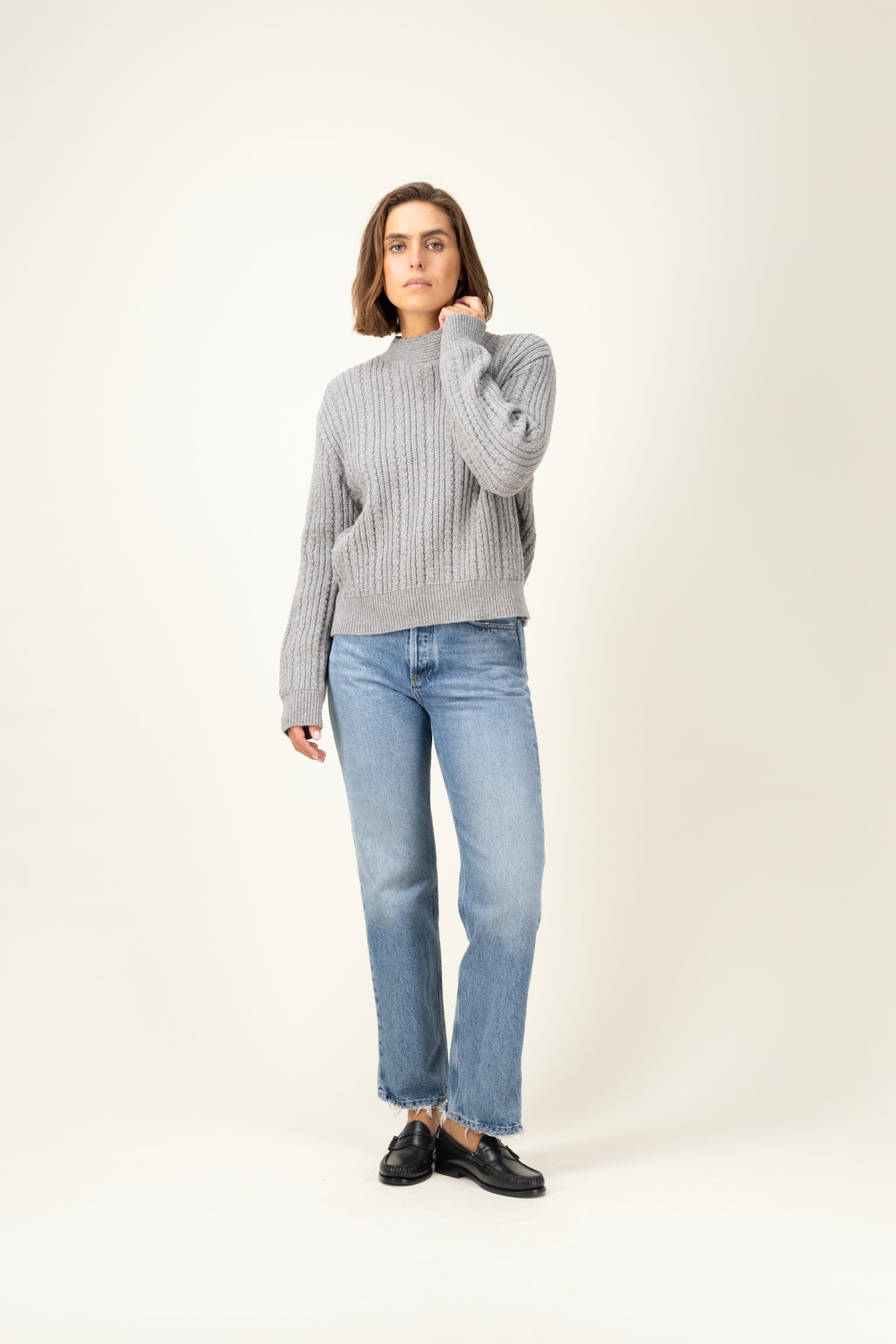 Produit Pull Méliné col rond gris chiné confectionné par la marque Parisienne Tricots Jean Marc 1972.