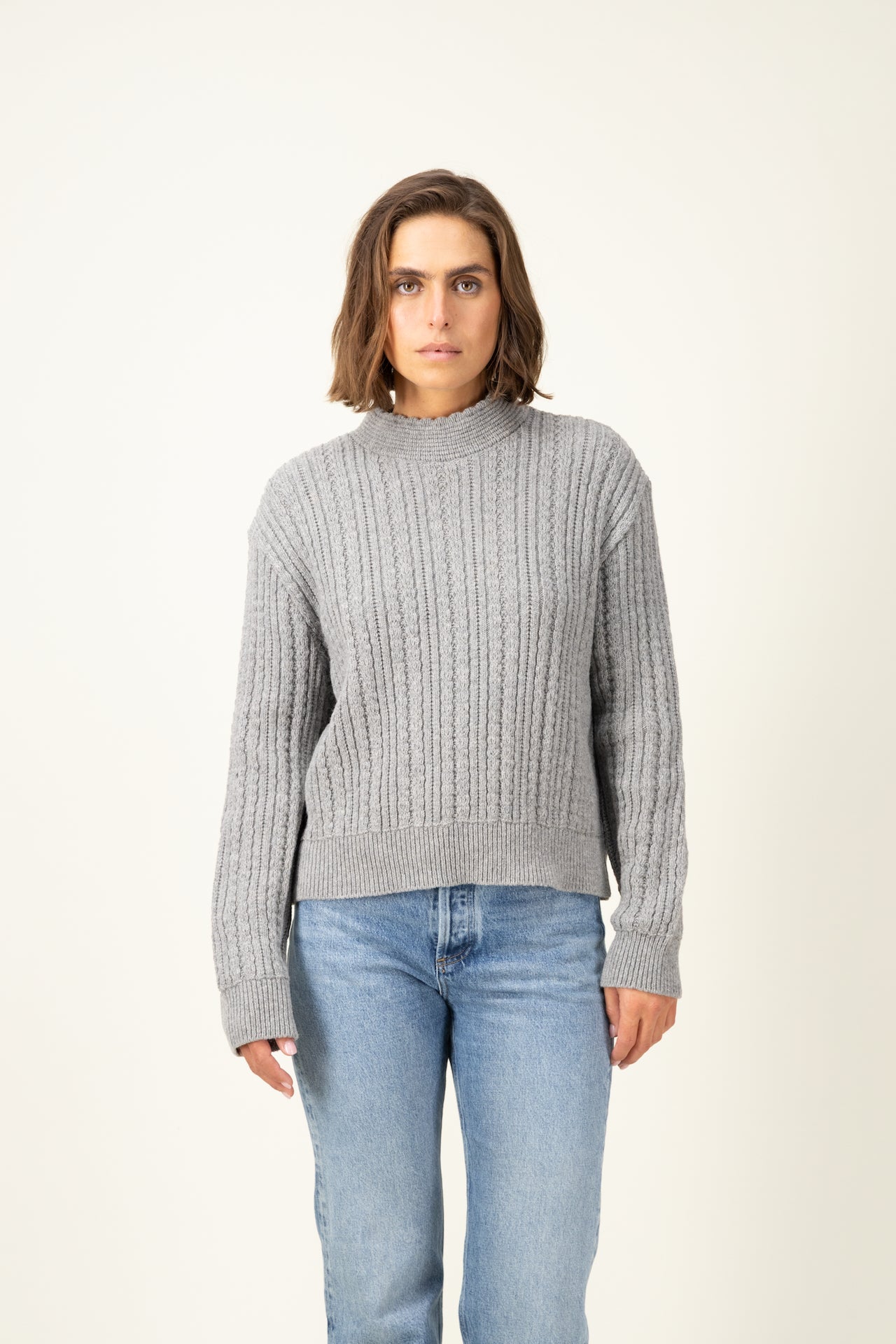 Produit Pull Méliné col rond gris chiné confectionné par la marque Parisienne Tricots Jean Marc 1972.