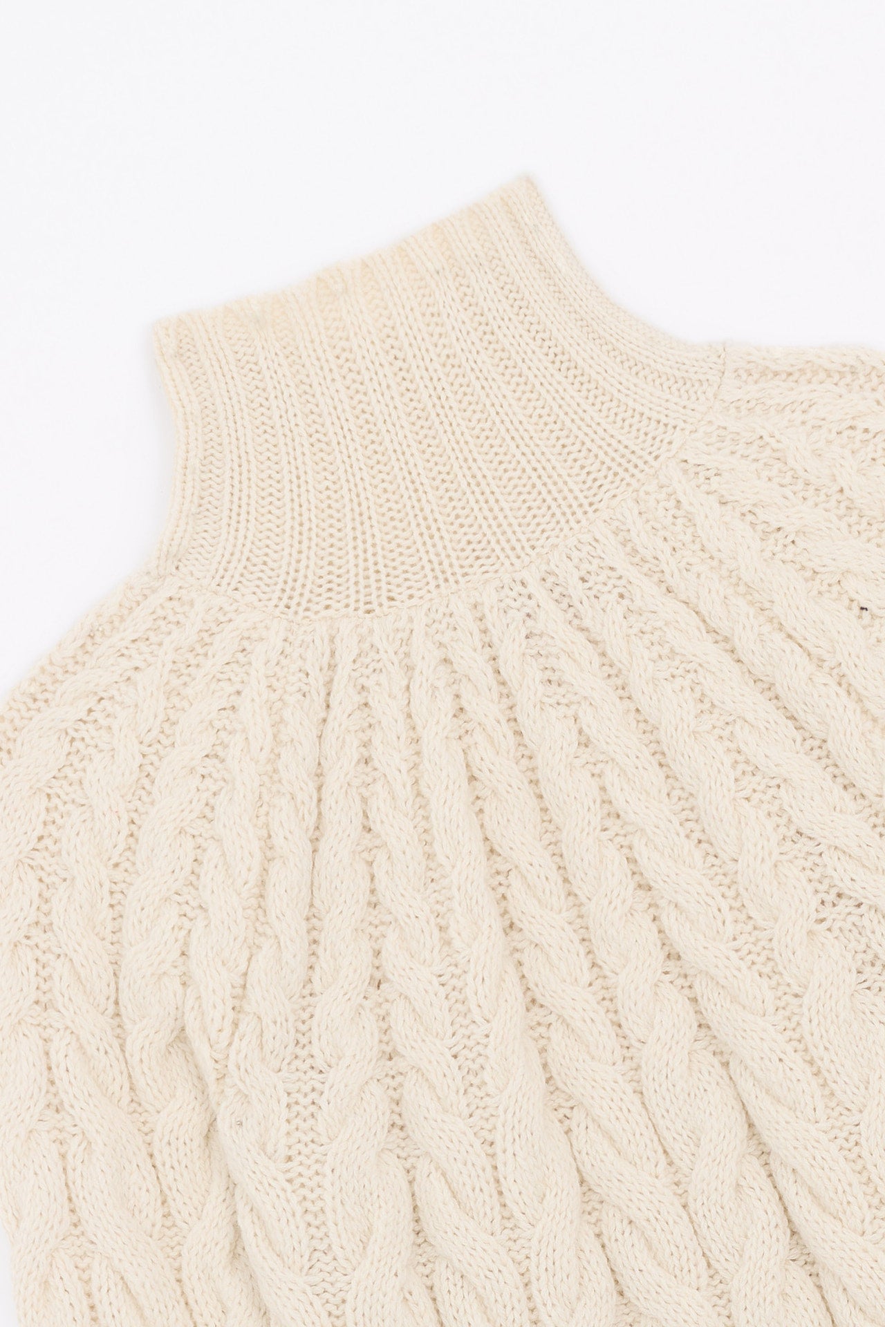 Produit Pull Méliné torsades écru confectionné par la marque Parisienne Tricots Jean Marc 1972.