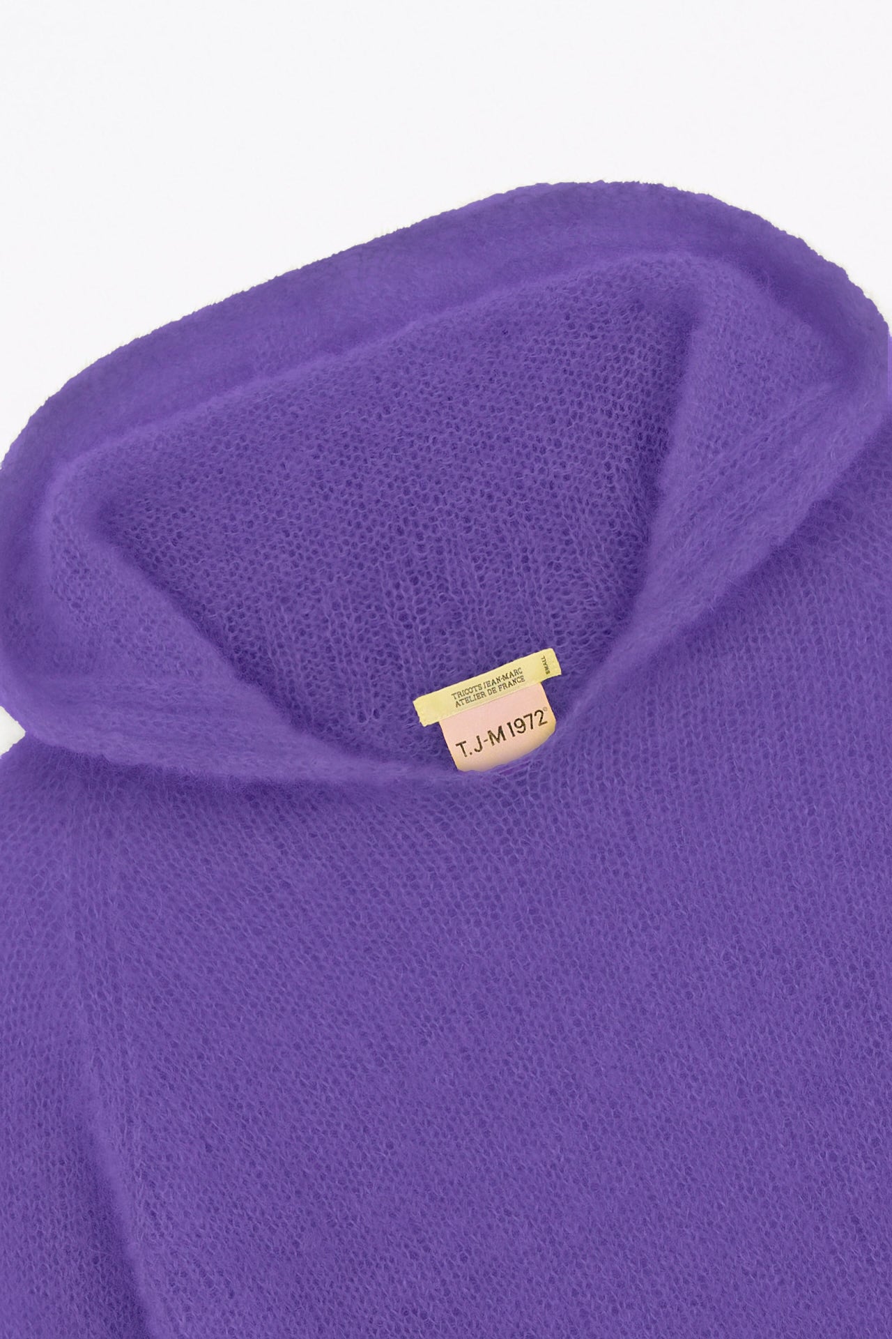 Produit Anouch capuche violet confectionné par la marque Parisienne Tricots Jean Marc 1972.