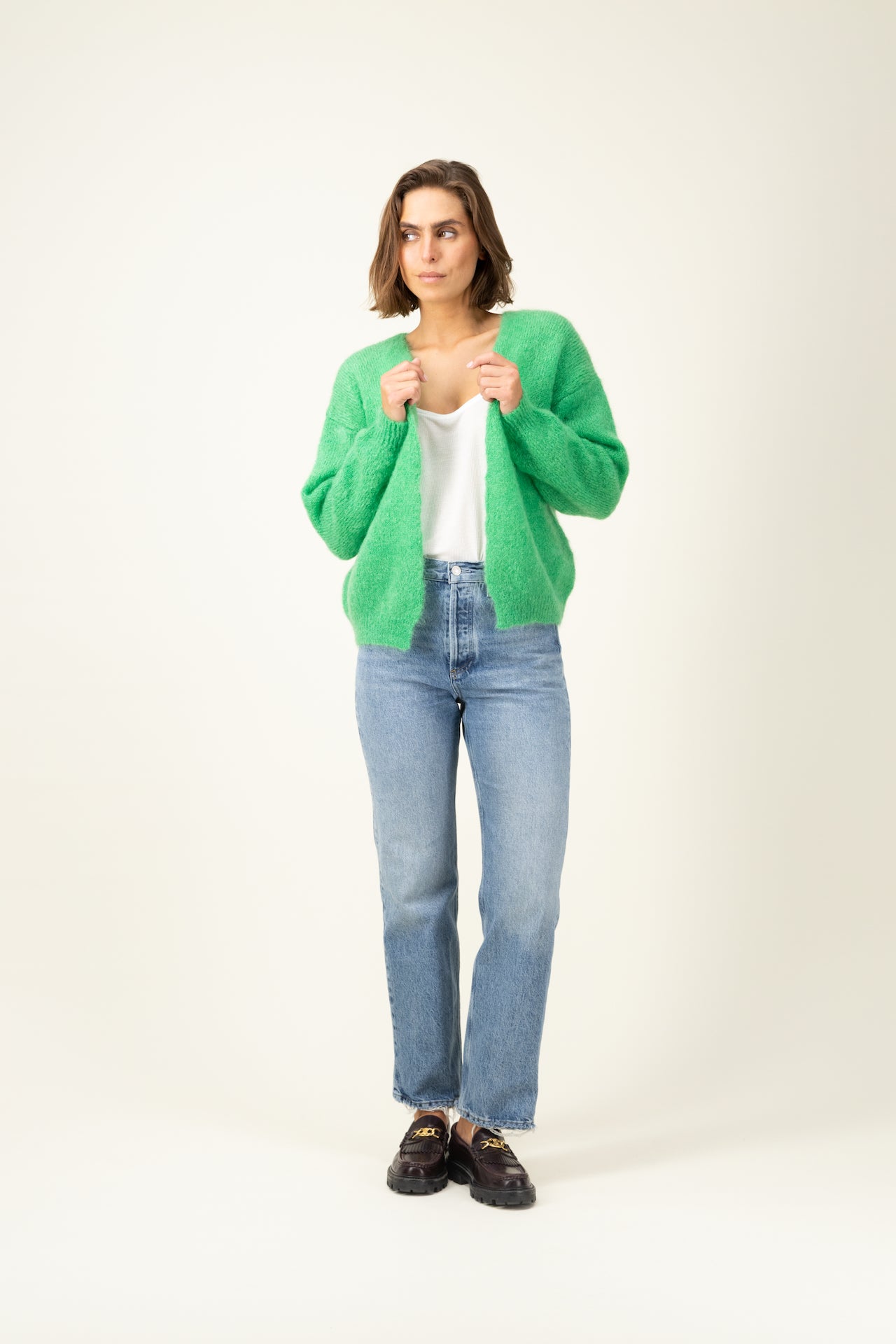 Produit Gilet Anouch vert pomme confectionné par la marque Parisienne Tricots Jean Marc 1972.