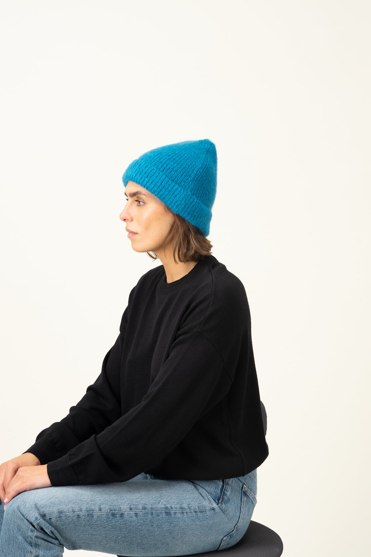 Produit Bonnet Anouch bleu canard confectionné par la marque Parisienne Tricots Jean Marc 1972.
