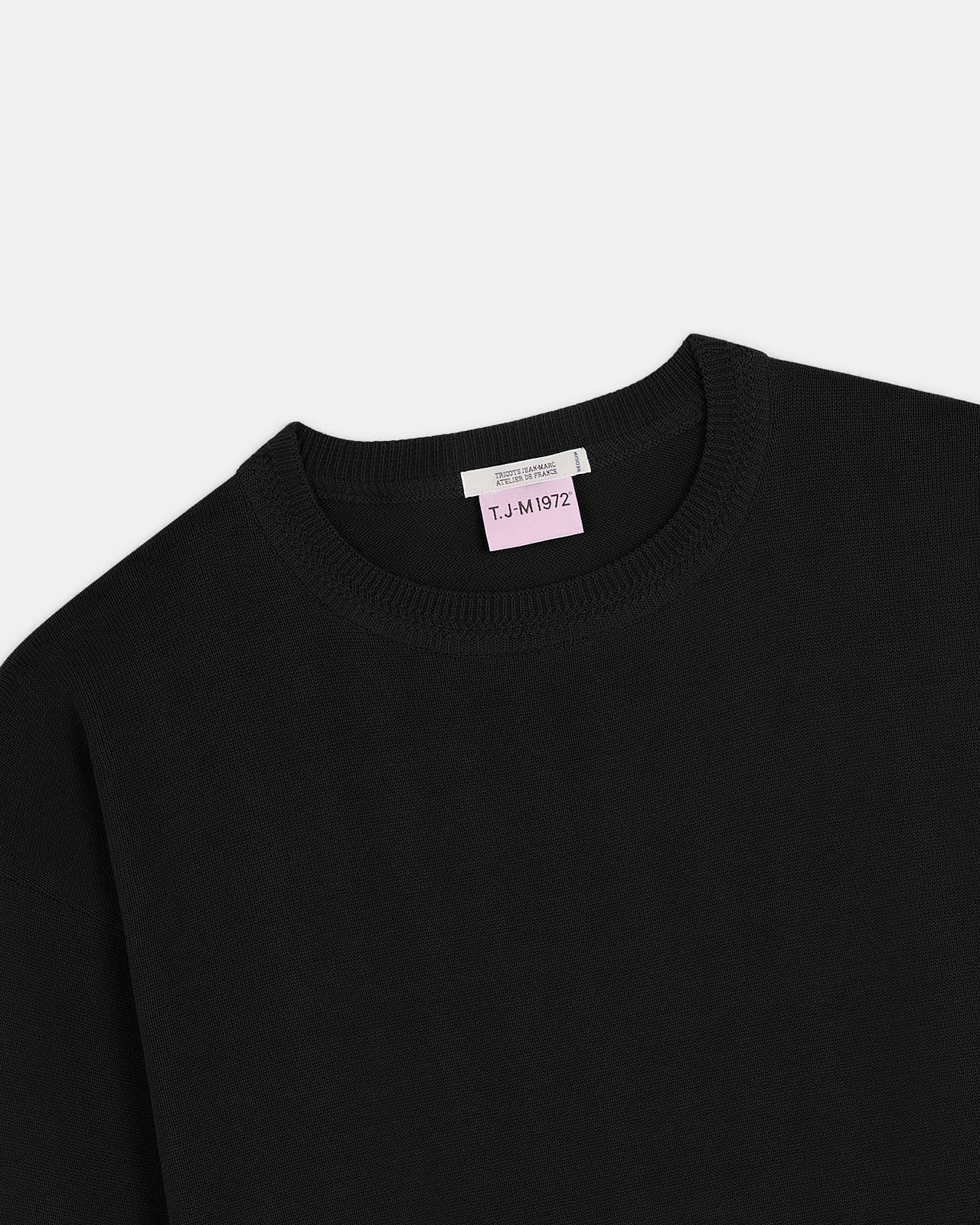 Produit Loucine col rond noir confectionné par la marque Parisienne Tricots Jean Marc 1972.