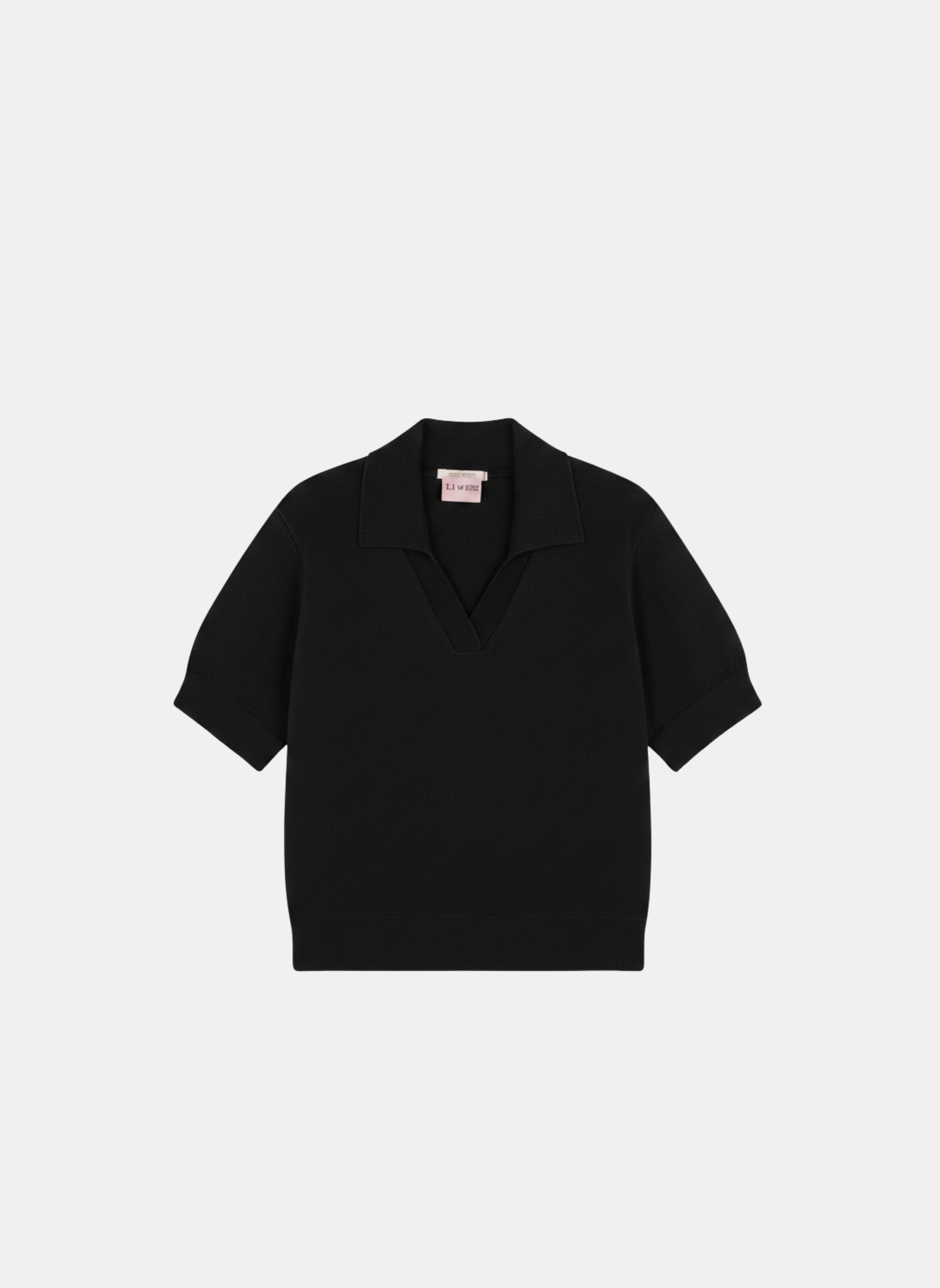 Produit Polo Loucine Noir confectionné par la marque Parisienne Tricots Jean Marc 1972.