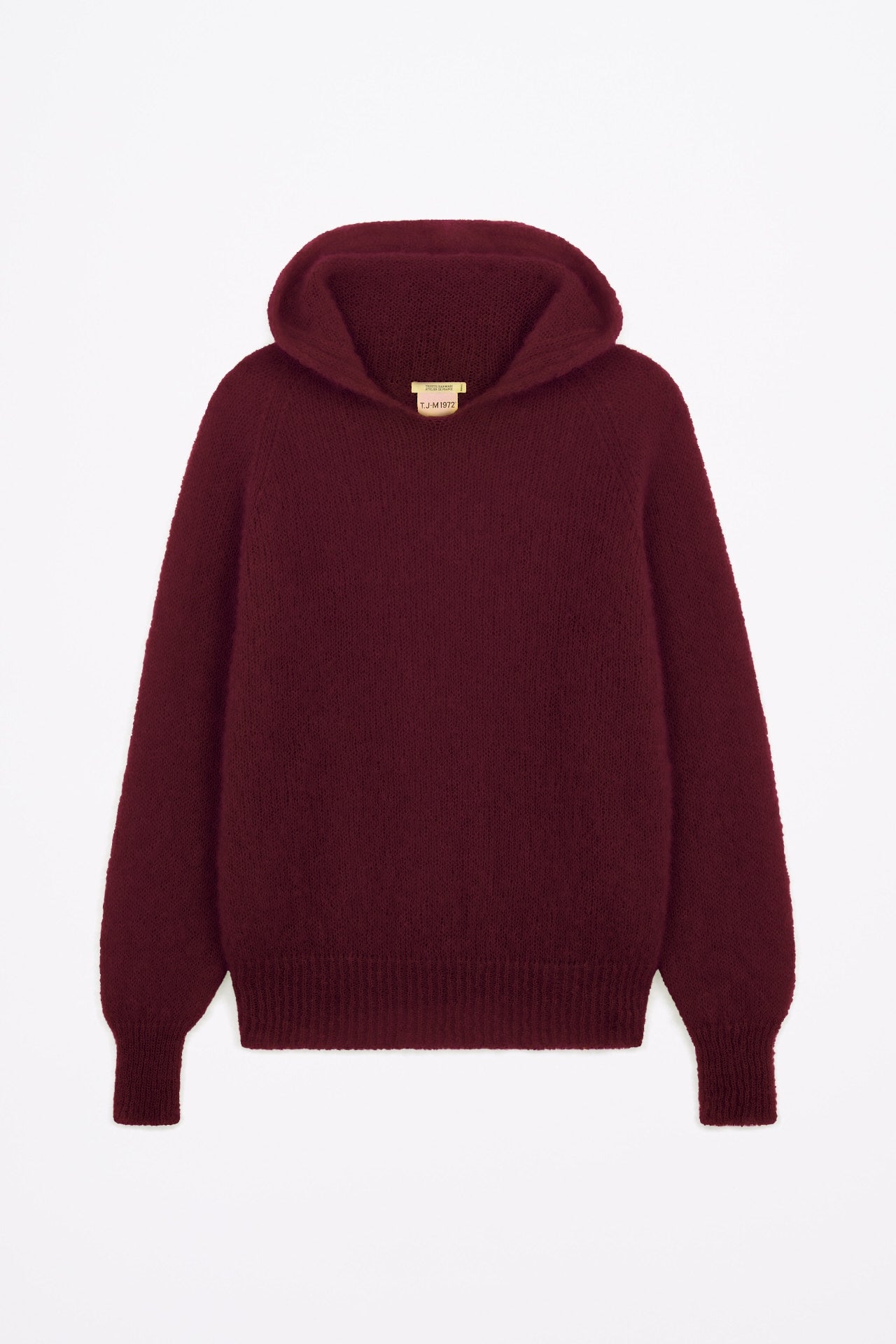 Produit Anouch capuche bordeaux confectionné par la marque Parisienne Tricots Jean Marc 1972.