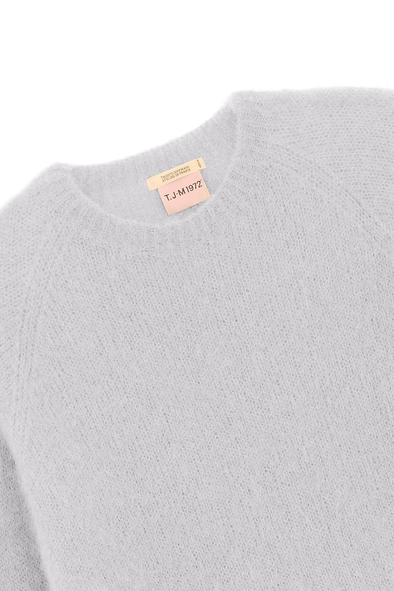 Produit Anouch col rond Anouch col rond confectionné par la marque Parisienne Tricots Jean Marc 1972.